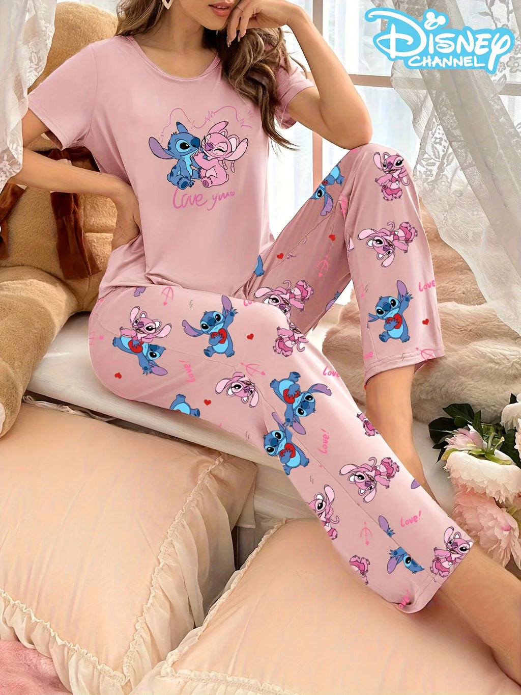 Women's pajama set with cute Disney Stitch prints, short-sleeved top and pants, comfortable for home or outdoor wear